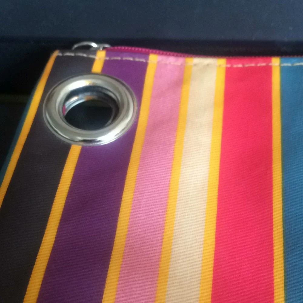 Striped cosmetic pouch